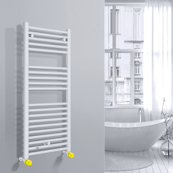 Valvola Custò colore giallo fissata a un termoarredo ad acqua