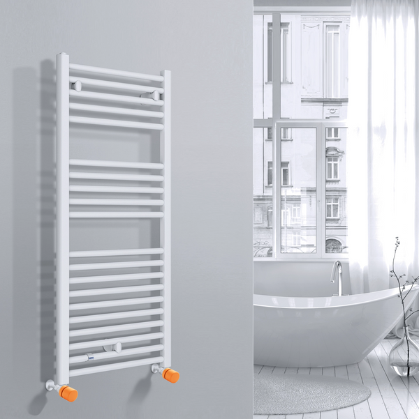 Valvola Custò colore arancione pastello fissata a un termoarredo ad acqua