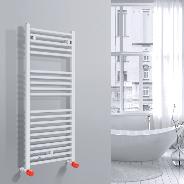 Valvola Custò colore arancione brillante fissata a un termoarredo ad acqua