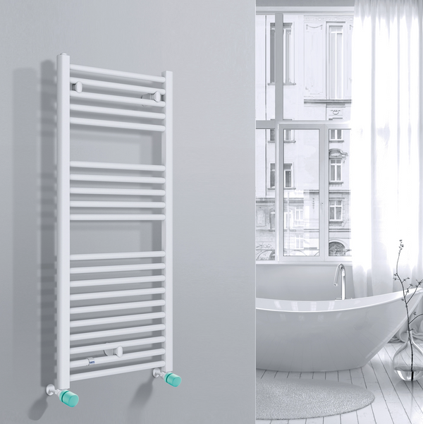 Valvola Custò colore verde chiaro fissata a un termoarredo ad acqua