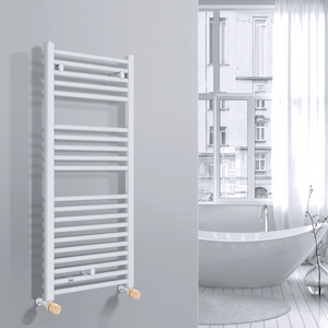 Valvola Custò colore abete fissata a un termoarredo bianco